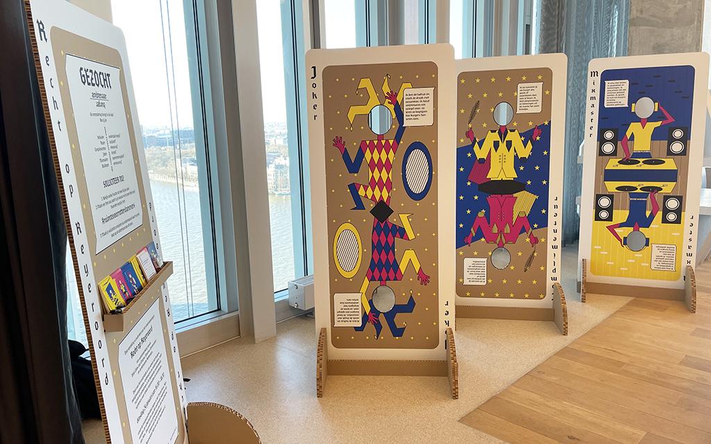 Photo of the life size playing card in the municipality building