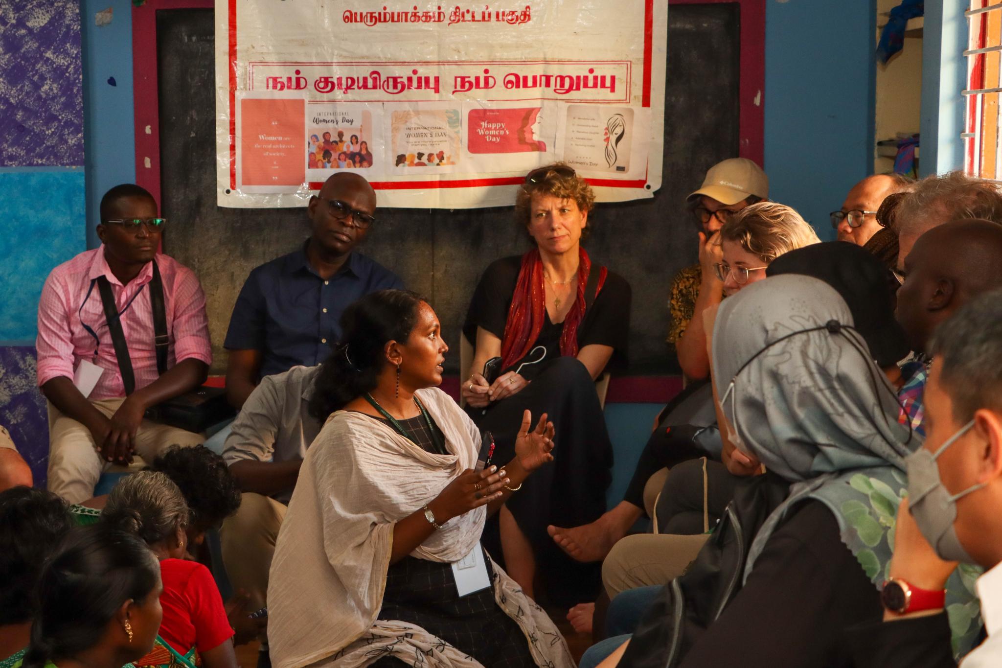 A group session with memebers of the resettled community